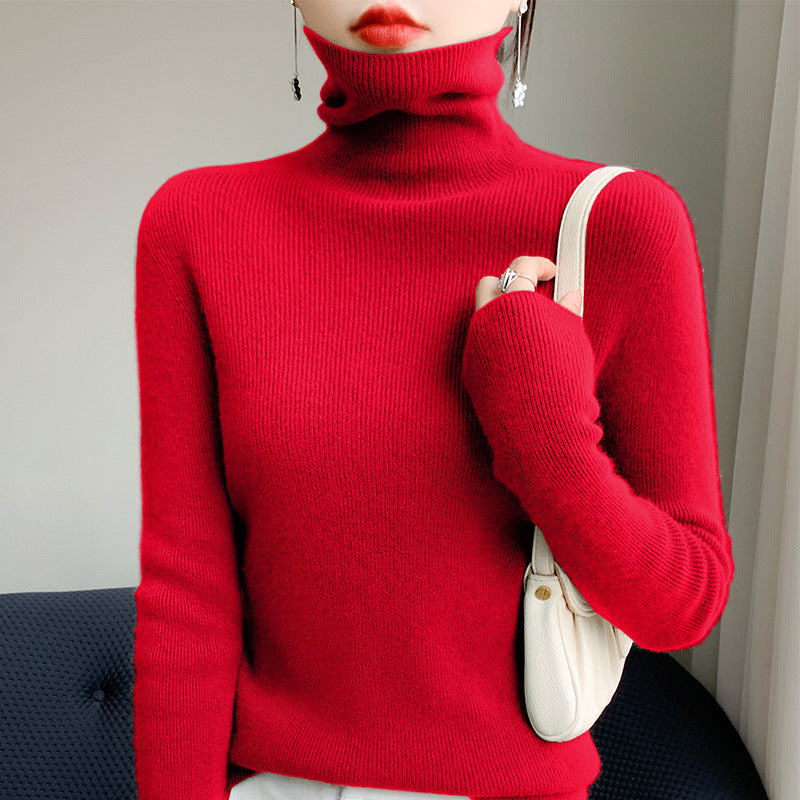 Women's knitted pullover with stand-up collar, fitted