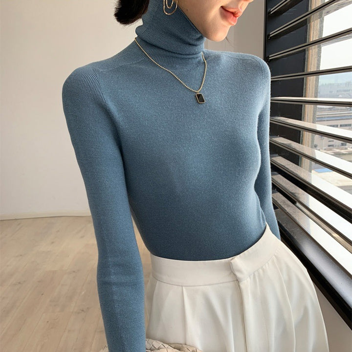 Women's knitted sweater, fitted, with stand-up collar