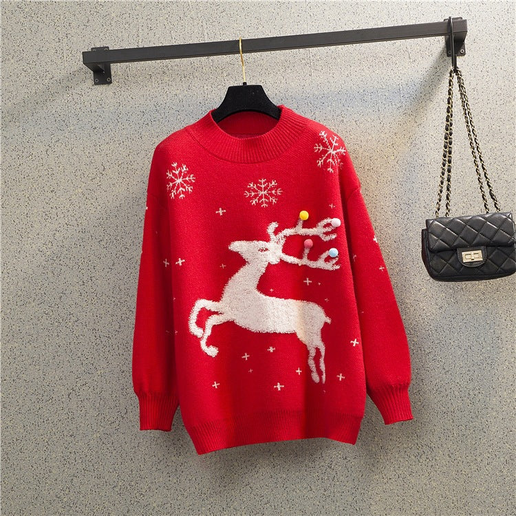 Loose women's Christmas sweater with reindeer motif