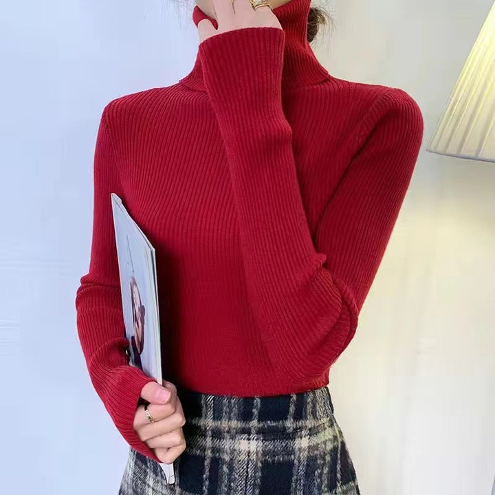 Form-fitting women's turtleneck sweater