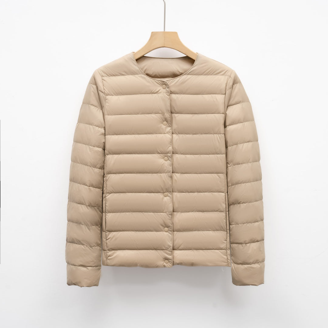 Light women's quilted jacket with round neckline
