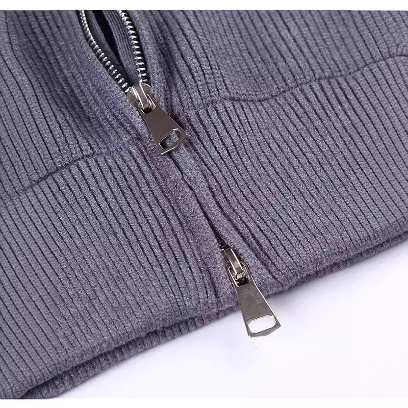 Loose women's knit sweater with zipper and stand-up collar
