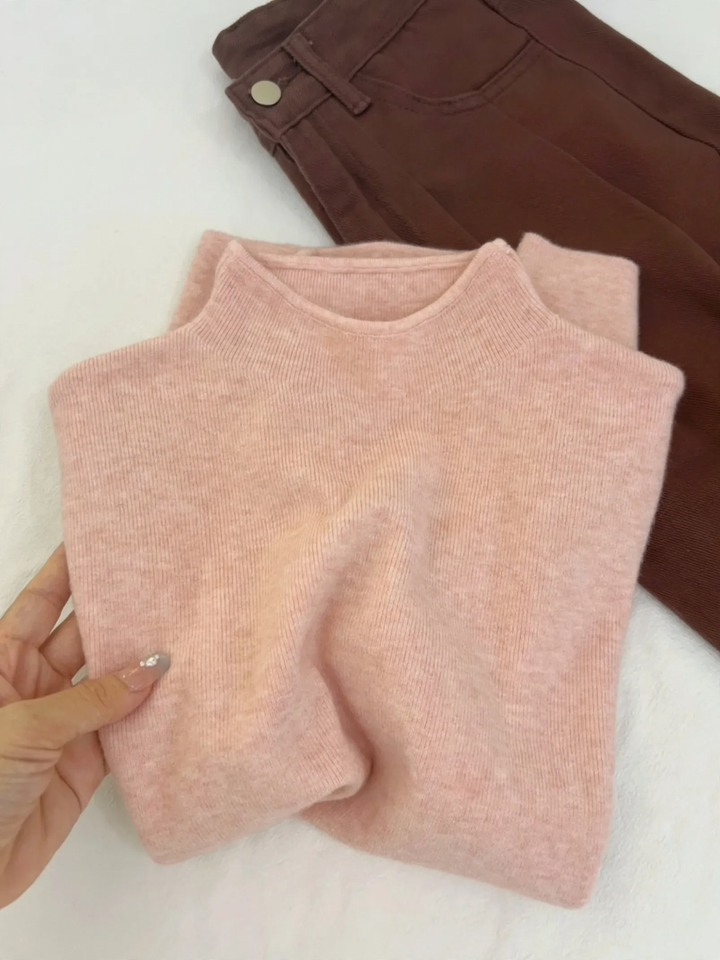 Slim women's knitted sweater with stand-up collar