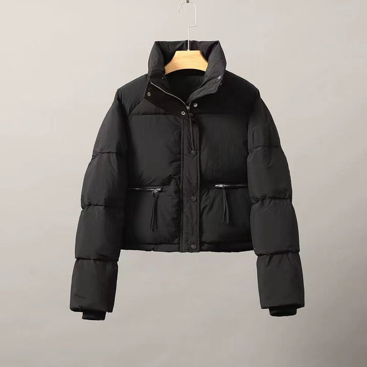 Short ladies' quilted jacket with stand-up collar