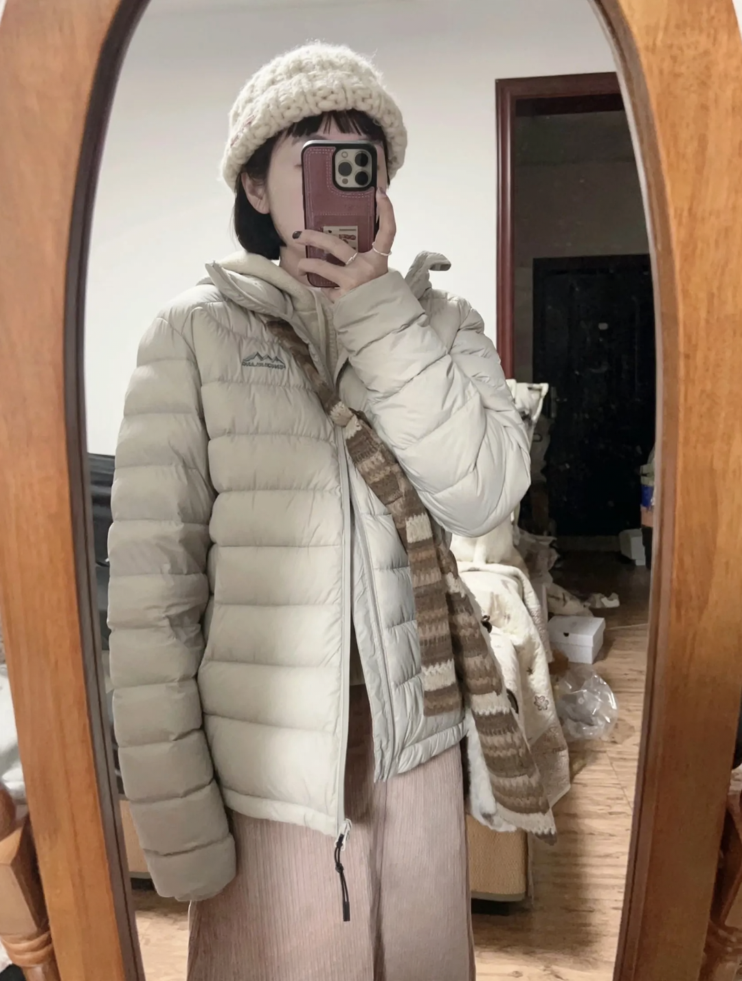 Light women's down jacket with hood