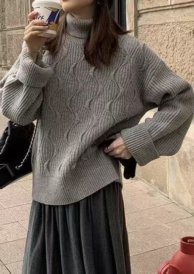 Padded knit sweater with roll neck