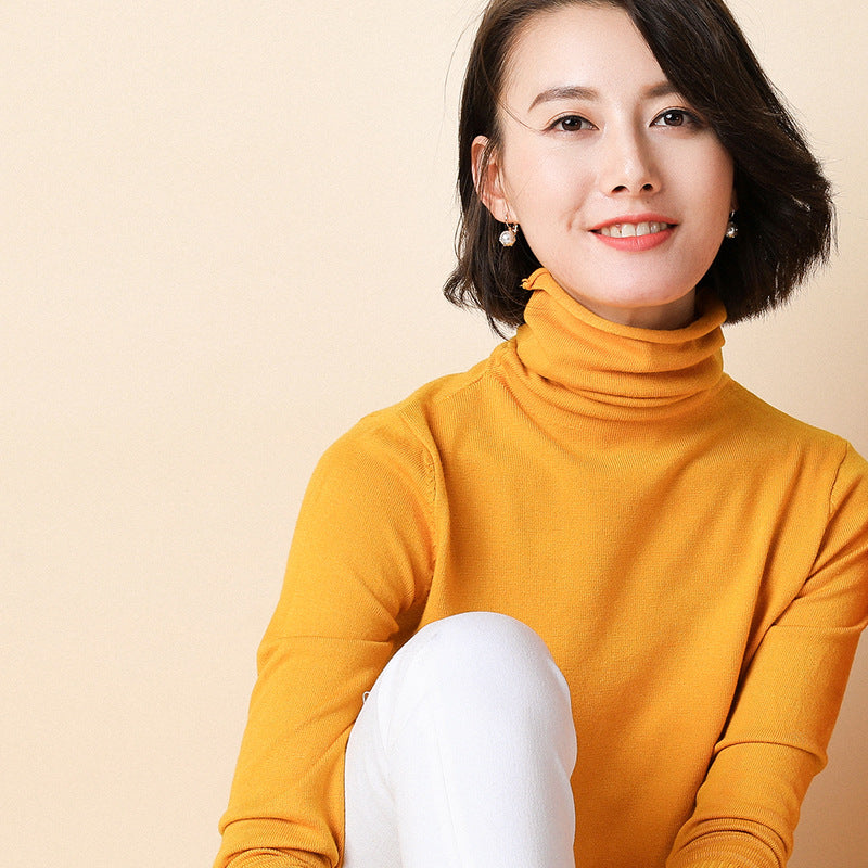 Women's knitted pullover with stand collar and geometric pattern