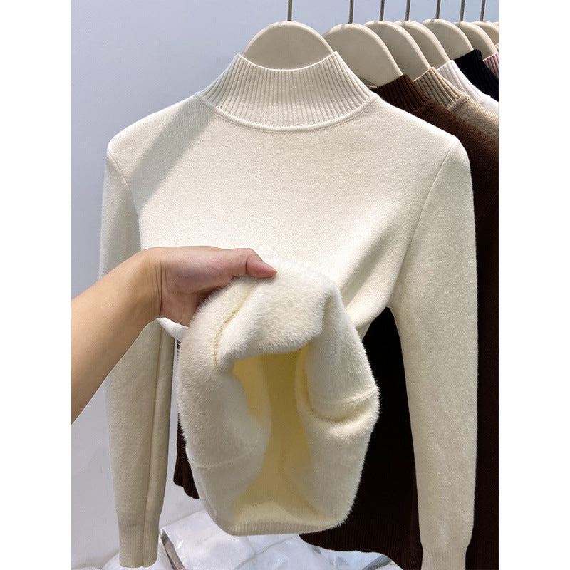 Padded women's knit sweater with high collar