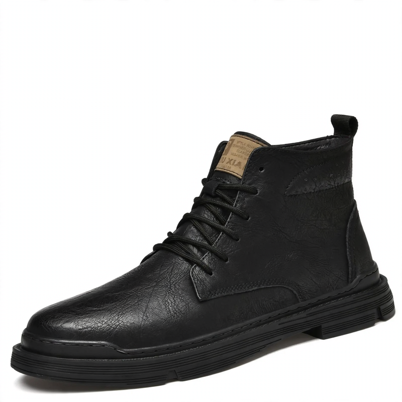 Padded men's leather boots with decorative stitching