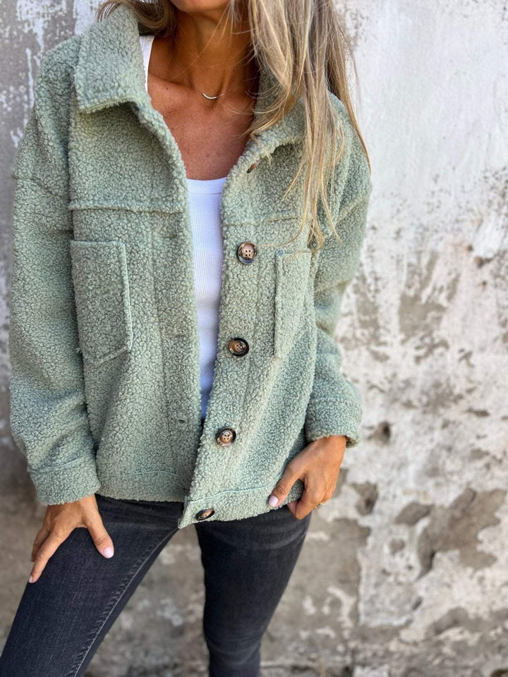 Faux fur jacket with lapels and button placket