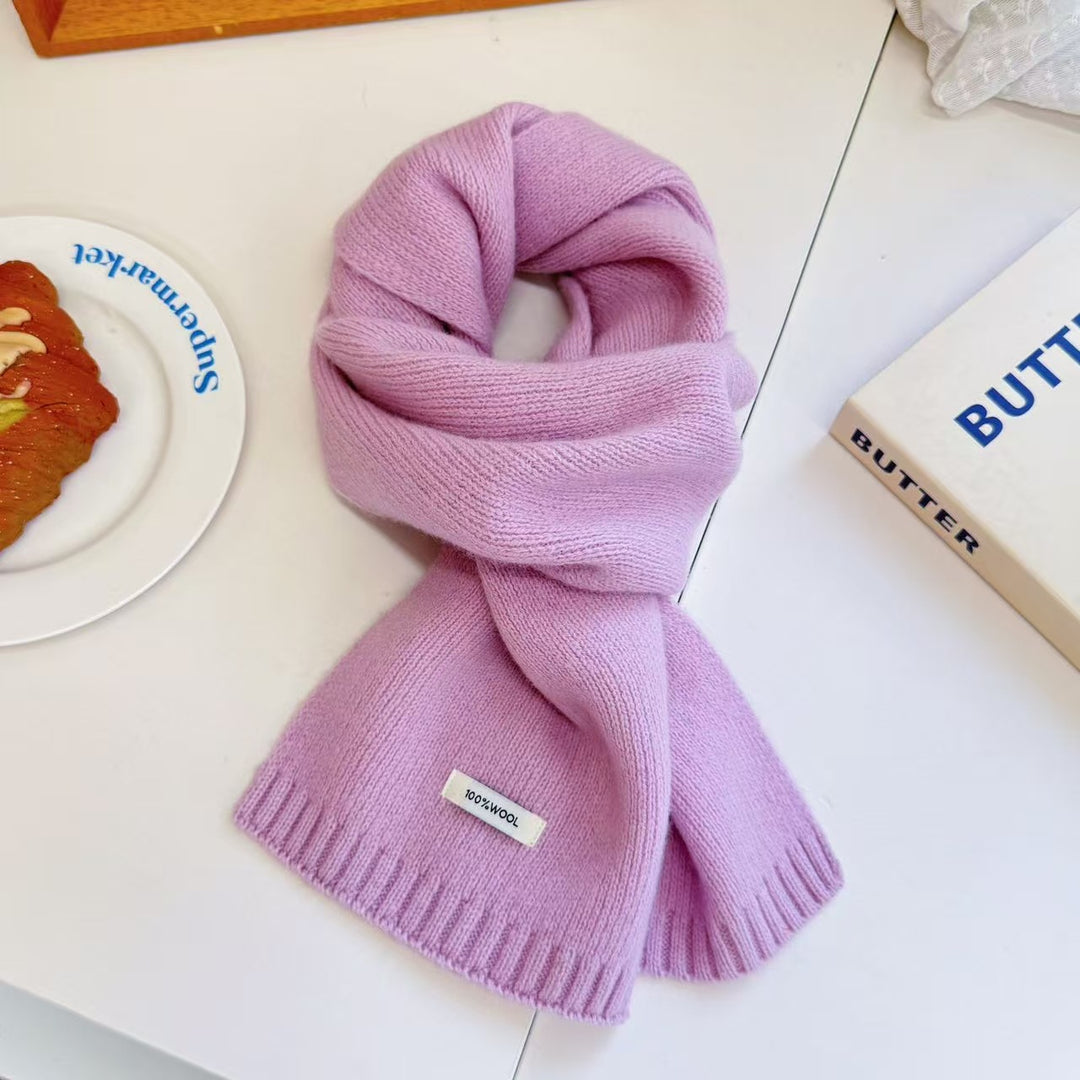 Simple knitted scarf made of pure wool