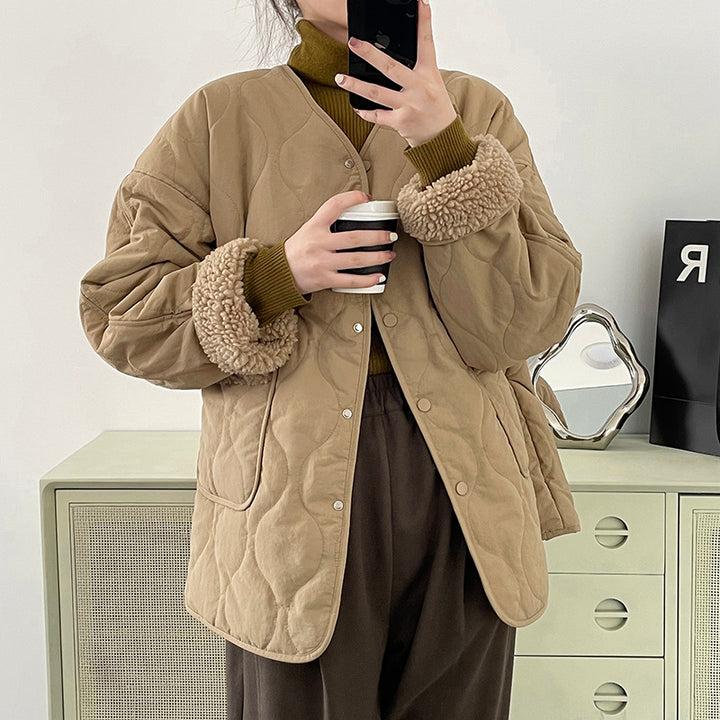 Women's quilted jacket with lambskin inserts and V-neck
