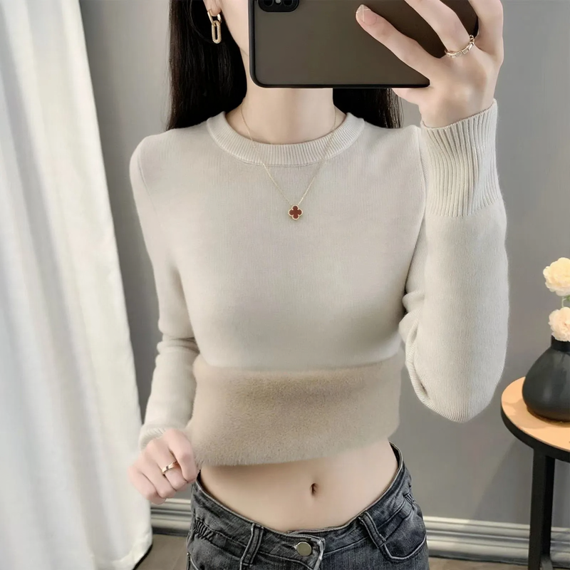 Padded women's knitted sweater for winter