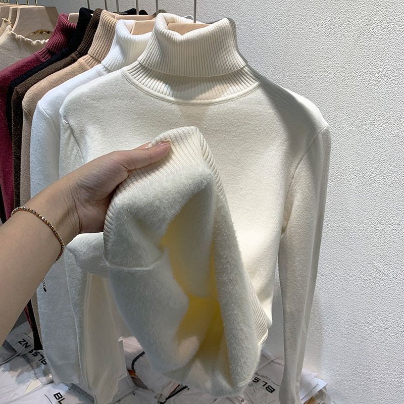 Women's knitted pullover with inner fleece, high collar