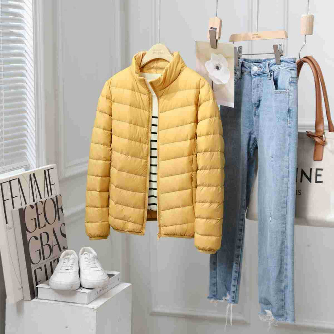 Light women's down jacket with stand-up collar, white duck down