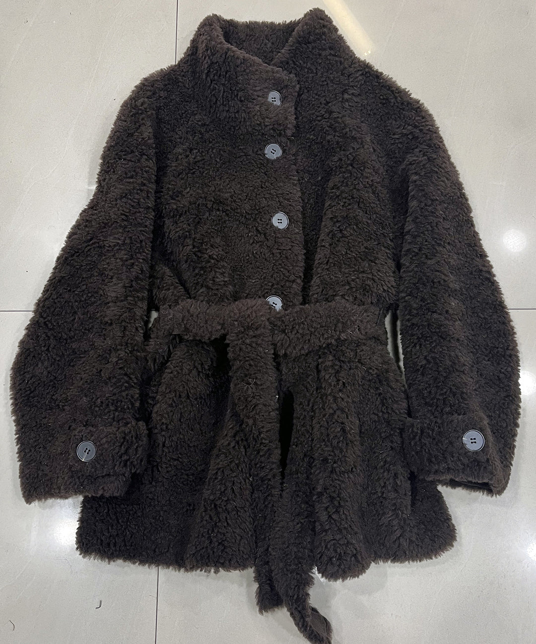 Sheepskin coat with tie belt