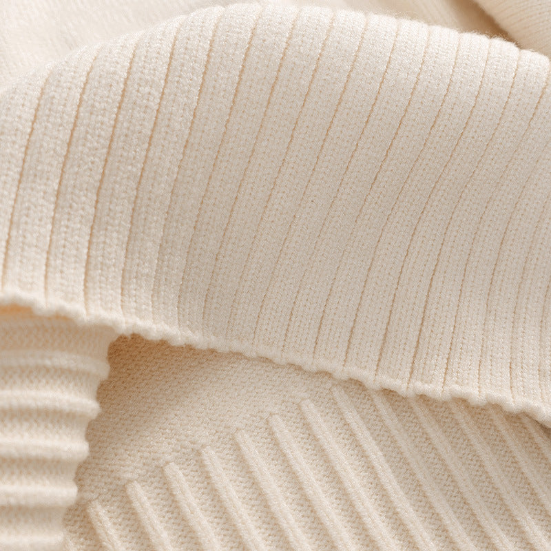 Women's cardigan with roll neck and puff sleeves