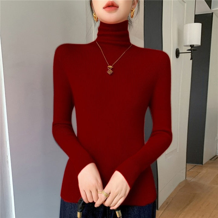 Women's knitted pullover with stand-up collar, fitted