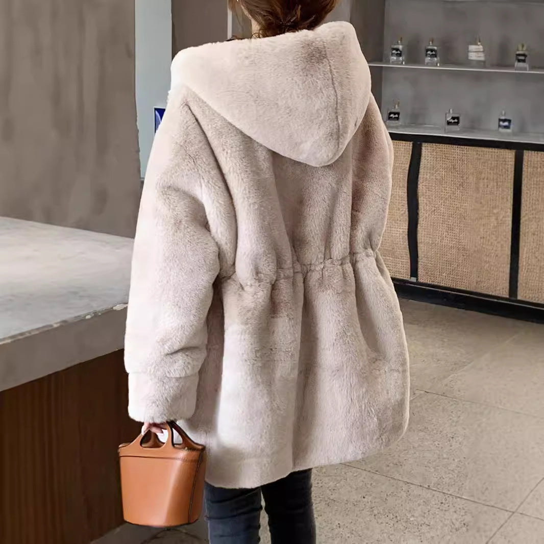 Long women's faux fur coat with hood and tailoring