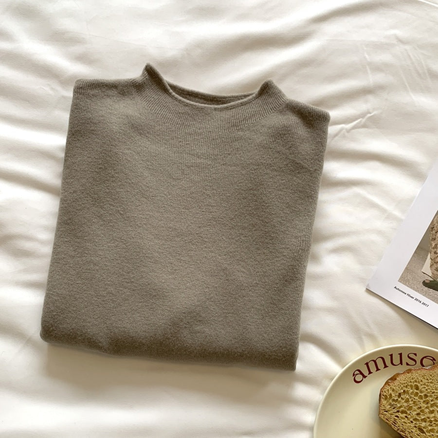 Women’s knit sweater with stand-up collar