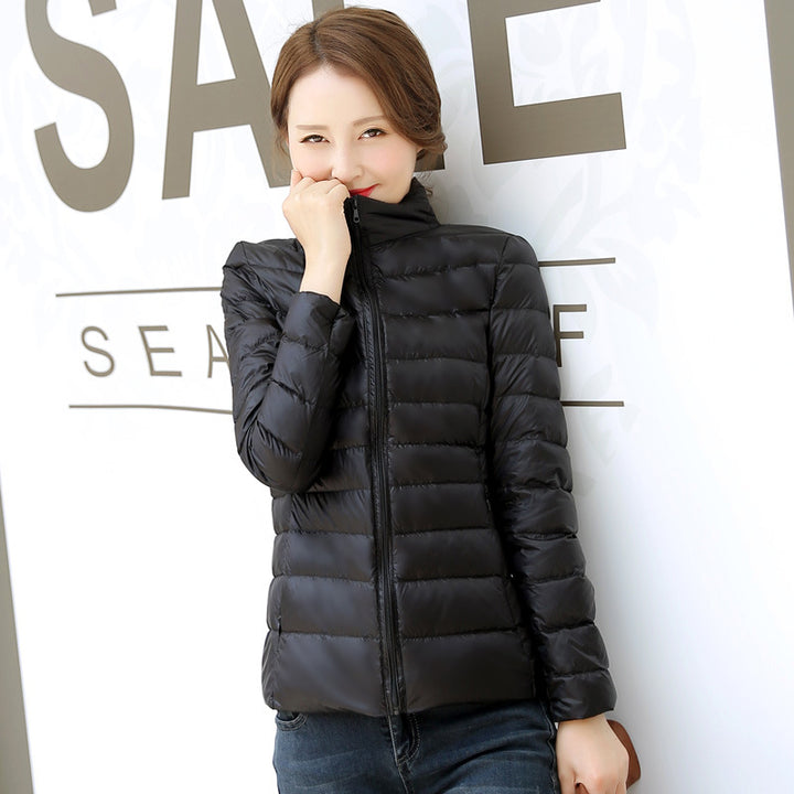 Light women's down jacket with stand-up collar, white duck down