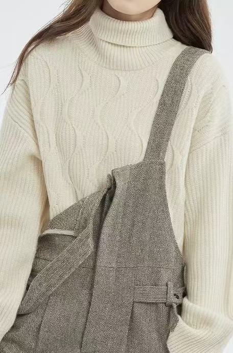 Padded knit sweater with roll neck