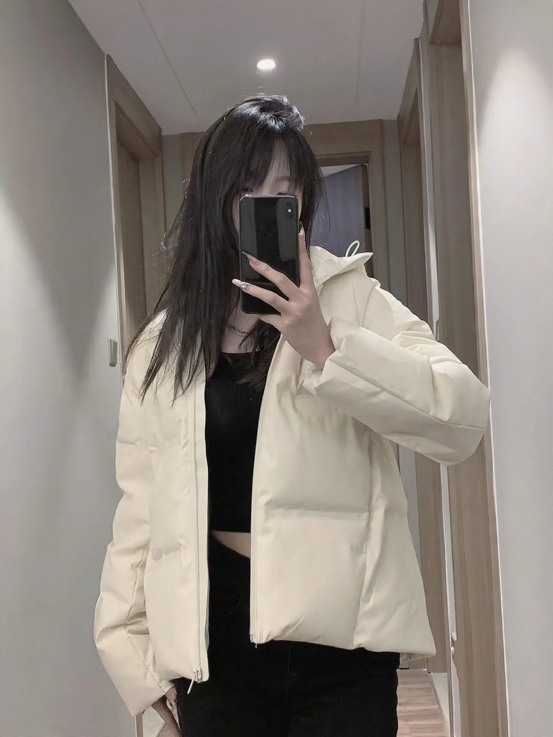 Padded women's winter jacket with hood