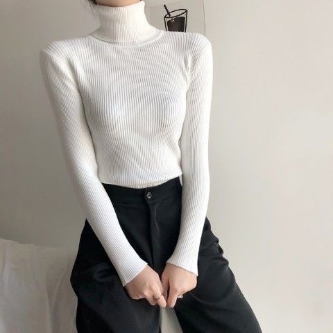 Form-fitting women's turtleneck sweater