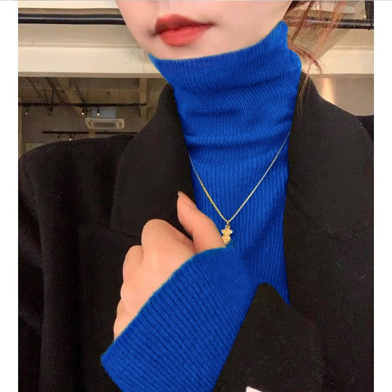 Women's knitted sweater, fitted, with stand-up collar