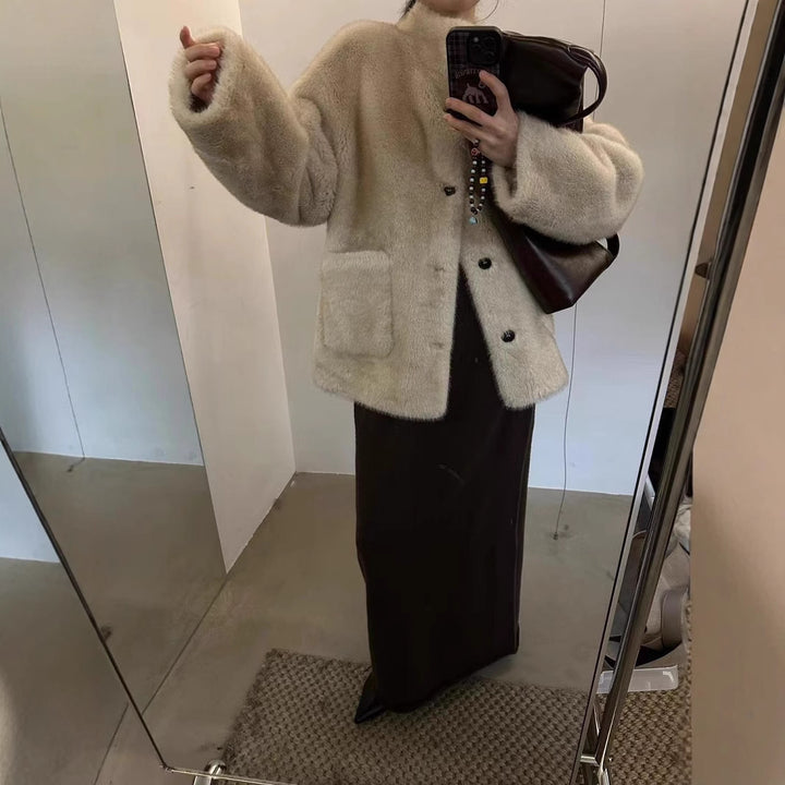 Fashionable faux fur coat, mid-length and lined