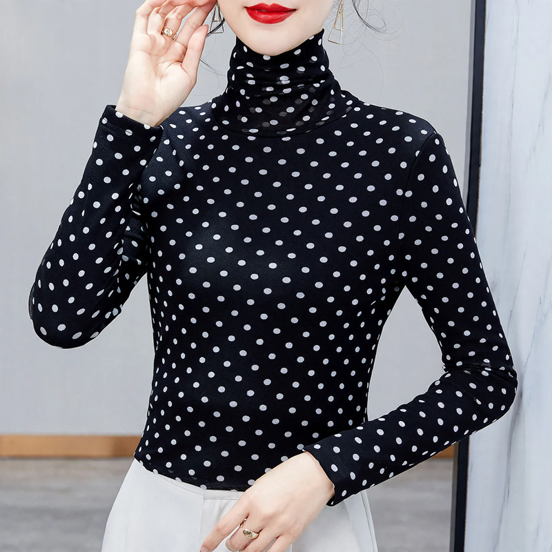 Women's top with stand collar and polka dot pattern
