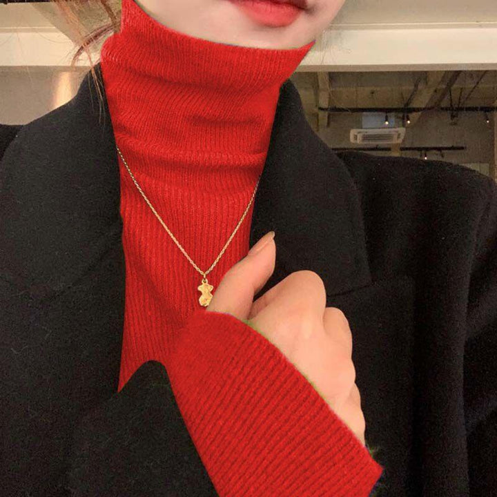 Elegant women's turtleneck sweater, slim fit