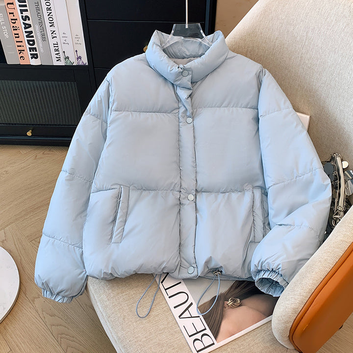 Short women's quilted jacket in a loose fit