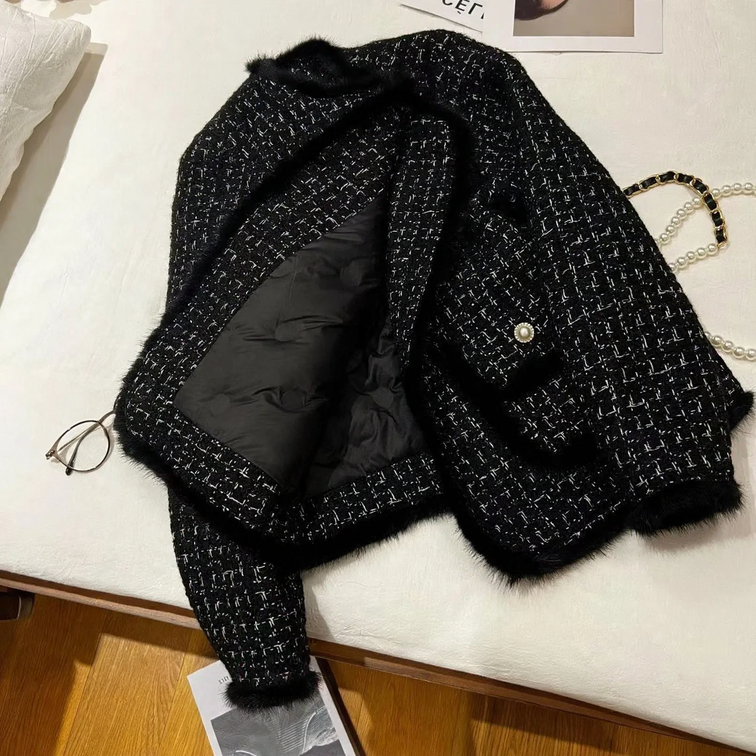 Elegant women's jacket made of lamb fleece, textured look