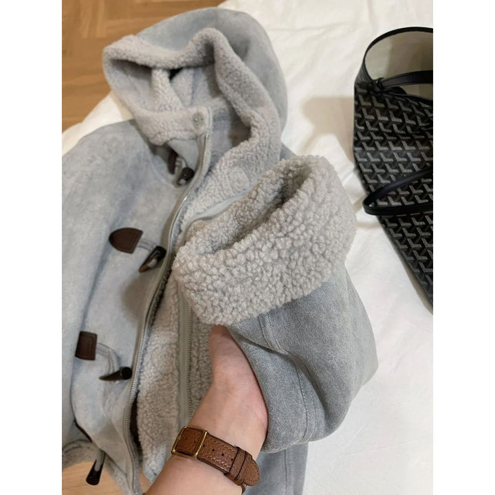 Modern hooded jacket made of lambskin imitation with toggle buttons