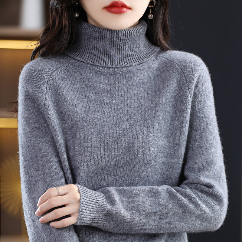 Women's knit pullover with stand-up collar, loose and long-sleeved