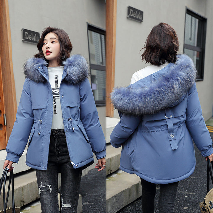 Padded women's parka with hood and faux fur trim