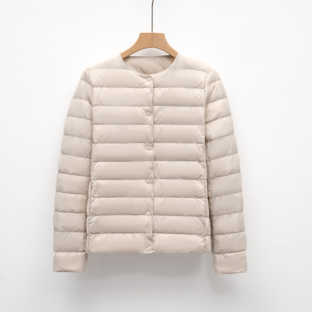 Light women's quilted jacket with round neckline