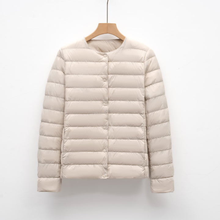 Light women's quilted jacket with round neckline