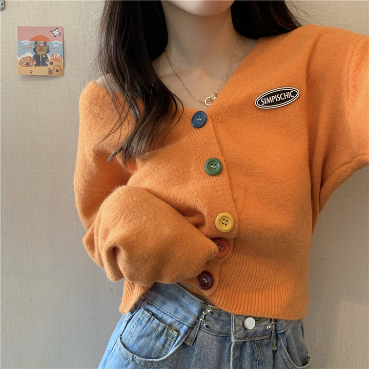 Gilet décontracté pour femmes avec des boutons colorés et col en V Chic & Stil