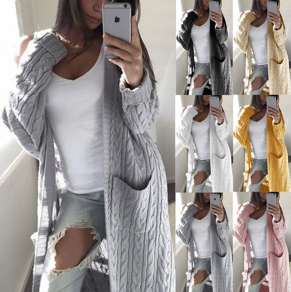 Women's knitted coat with patterns and practical pockets in an open cut Amarae