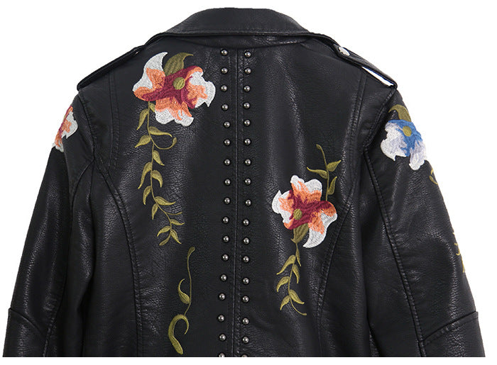 Ladies elegant biker jacket with floral embroidery and studs Amarae