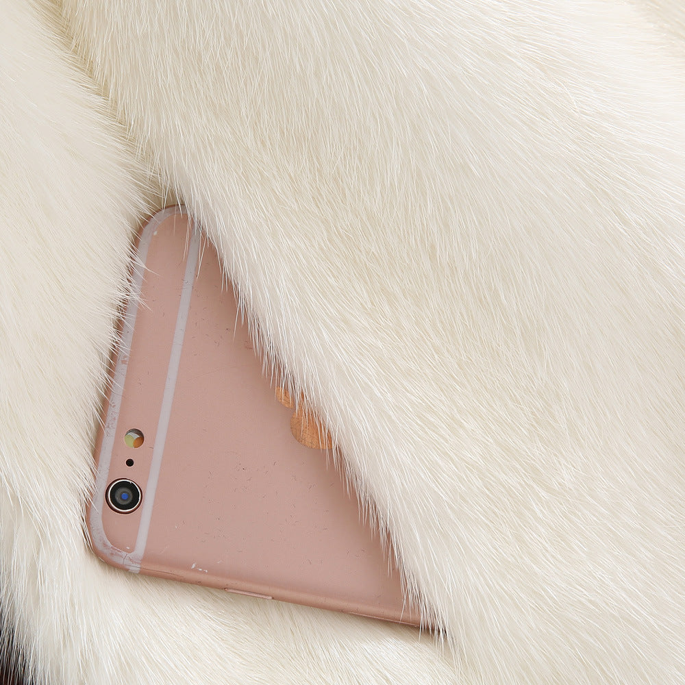Women's faux fur coat with stylish hood and classic cut Lune London