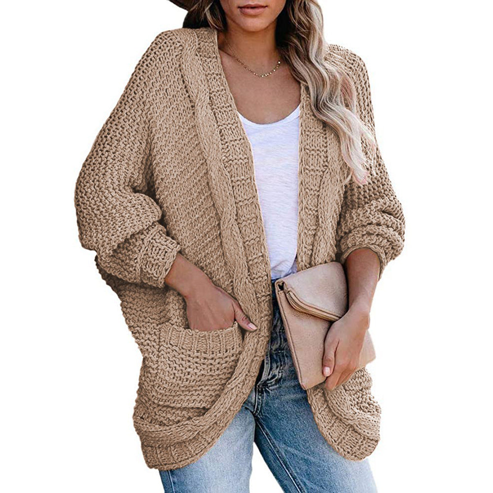Ladies chunky knit cardigan with open sleeves and spacious pockets Lune London