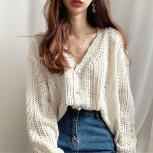 Casual knit jacket for women with an elegant cable pattern and large buttons Amarae