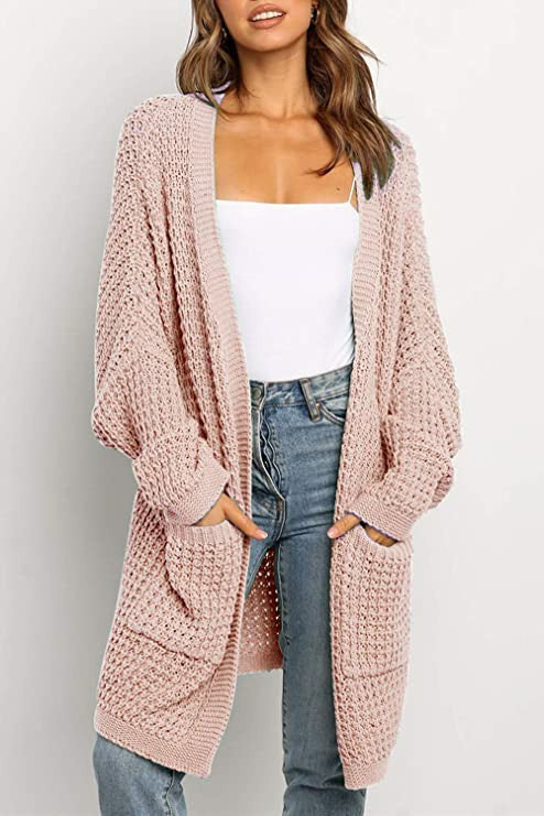 Dame Grosse Knit Cardigan with voluminous sleeves and practical pockets Lune London