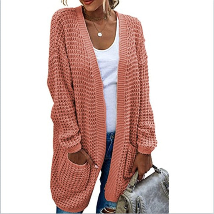 Ladies chunky knit cardigan with relaxed silhouette and open pockets Lune London