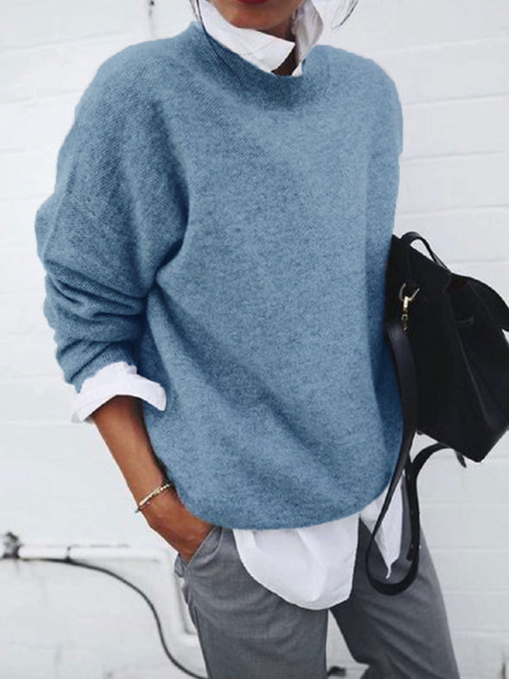 Pull féminin doux à col rond en mélange de tricots fins Chic & Stil