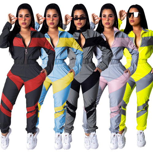 Ladies sporty jumpsuit with stylish color block elements and a high collar Amarae
