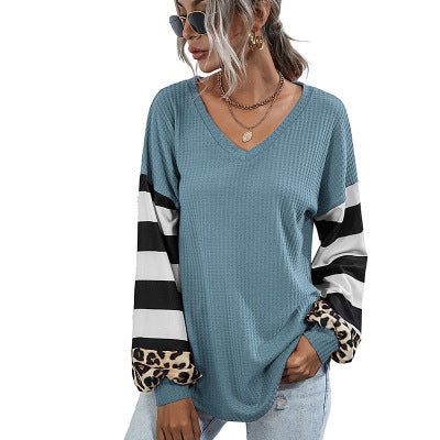 Women V-neck sports top with striking sleeves and unique details Lune London